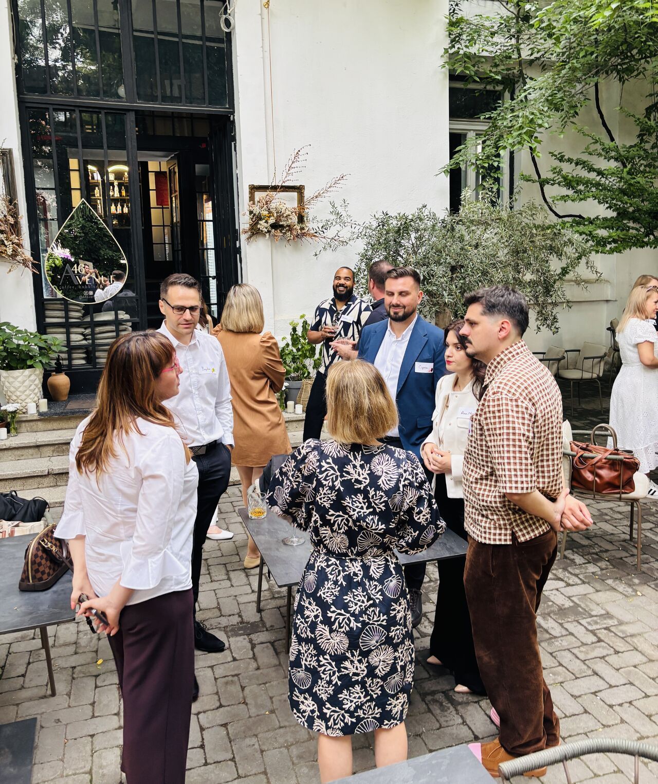 Founders and builders talking in the A46 courtyard in Bucharest