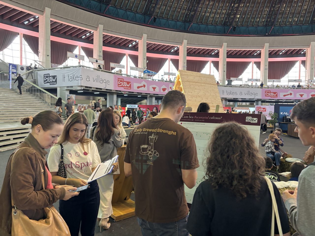 The 3rd Space Bucharest coffee vote wall surrounded by visitors at the Slow Coffee Festival, Romexpo