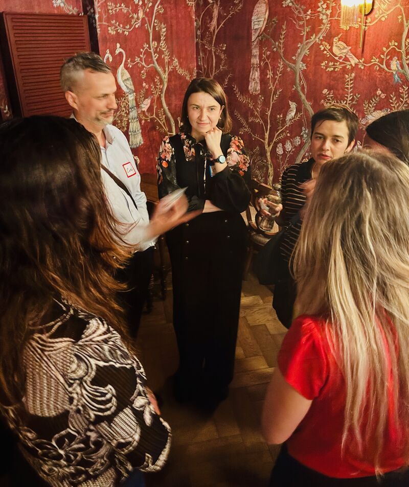 Guests deep in conversation at a 3rd Space Bucharest social