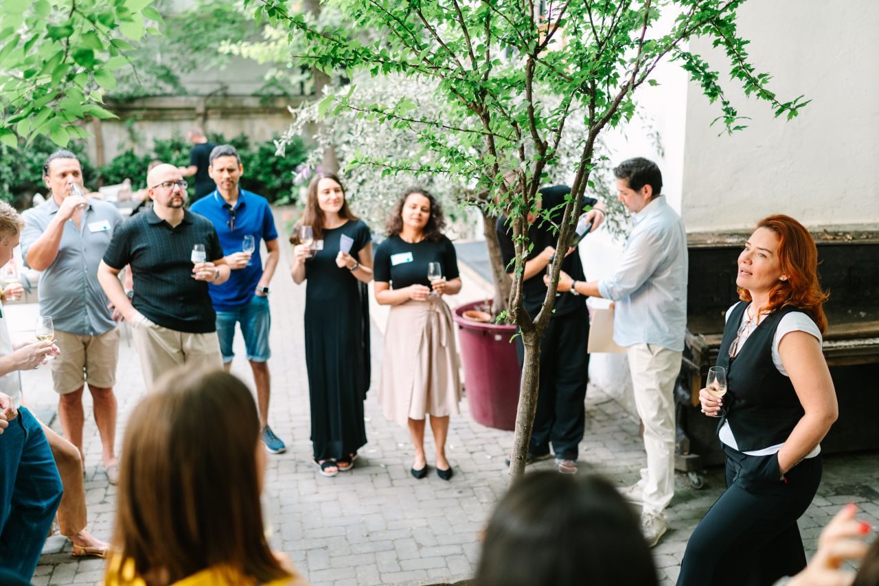 Wine educator Mirela Mateescu leading a Romanian wine tasting for 3rd Space Bucharest guests