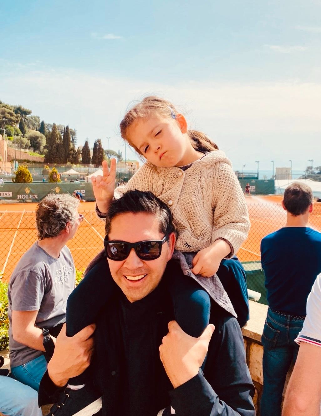 Eric Melchor with his daughter on his shoulders