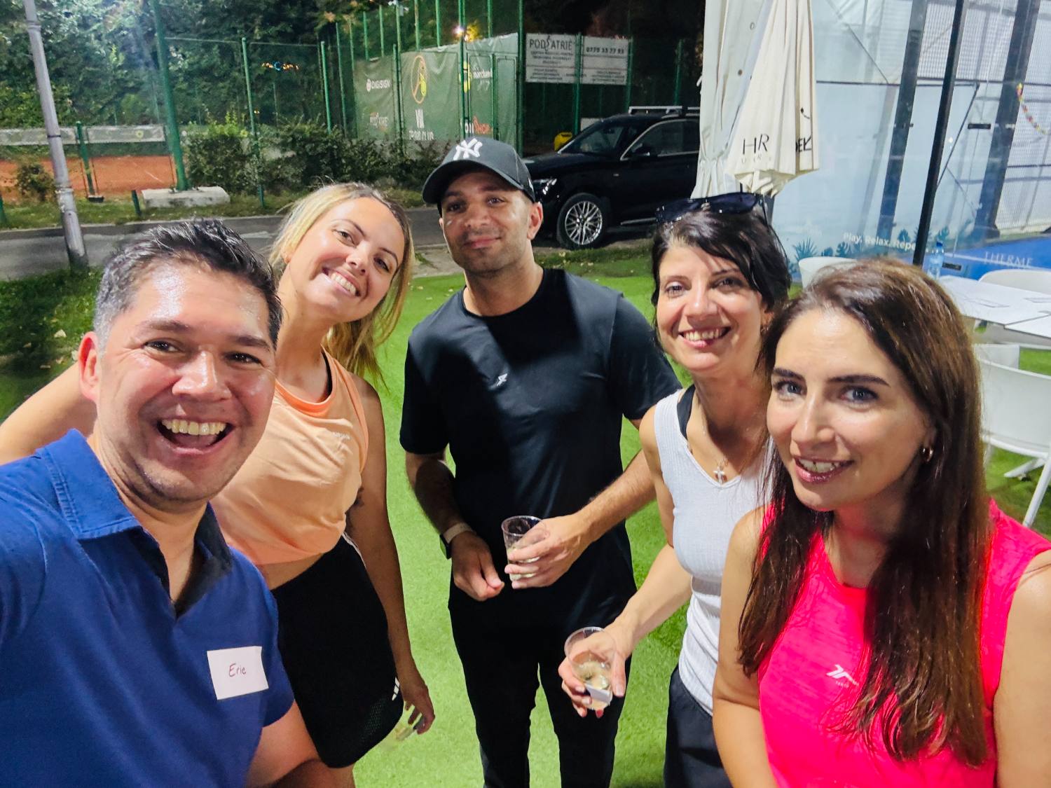 Guests on the padel court at a Padel + Prosecco evening